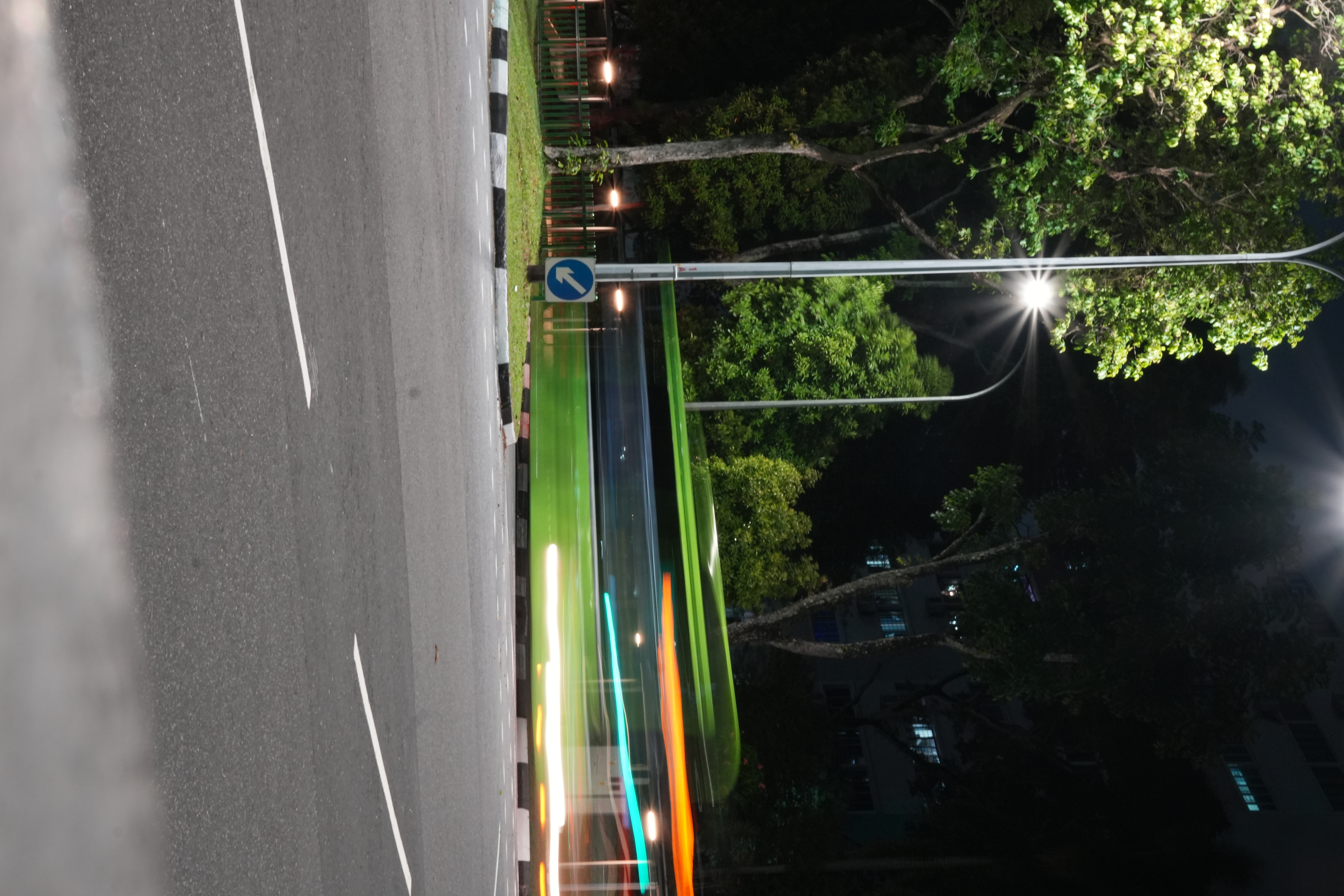 Long exposure image of bus passing by