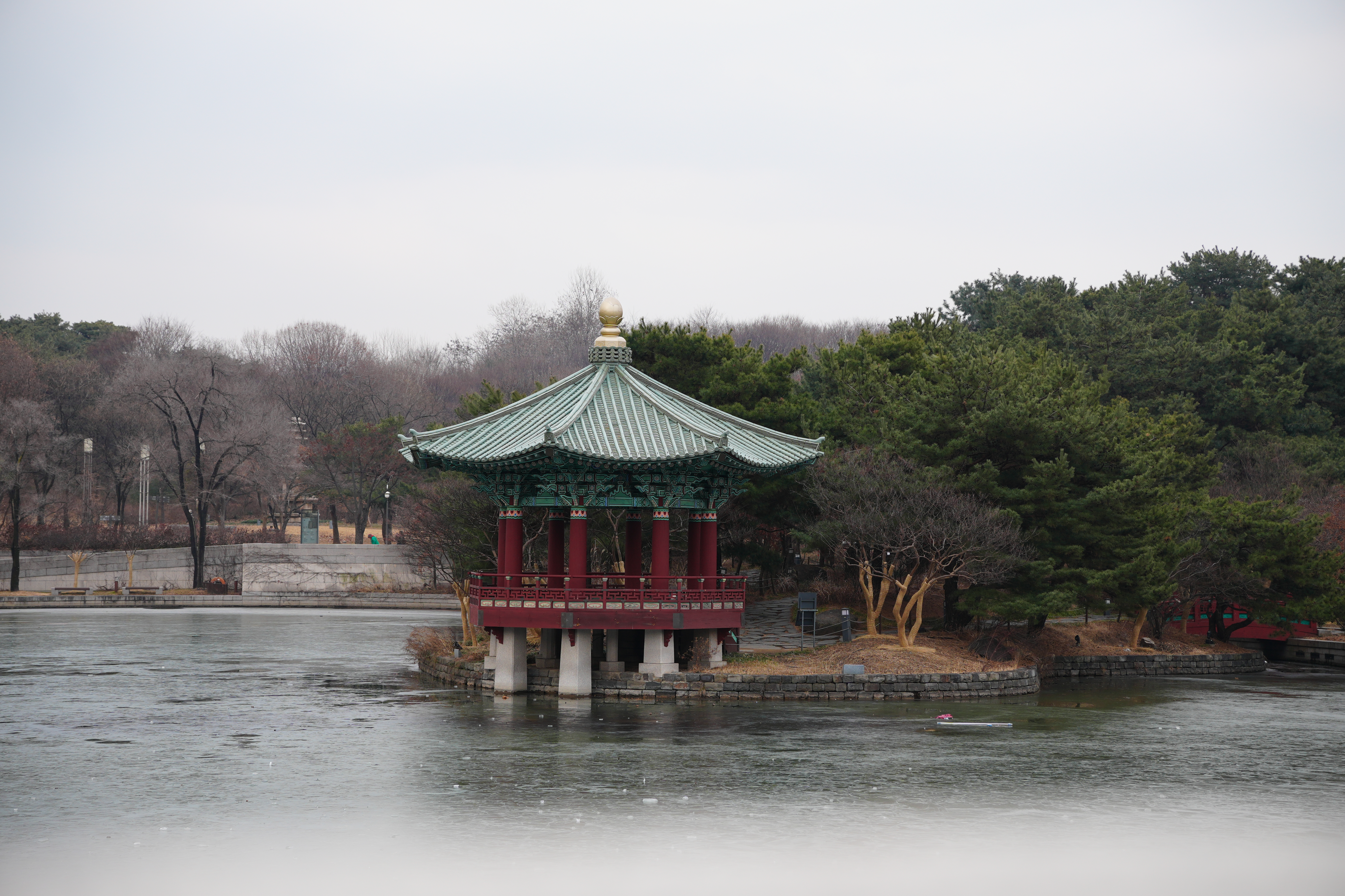 Temple on frozen lake in front of Seoul National Museum